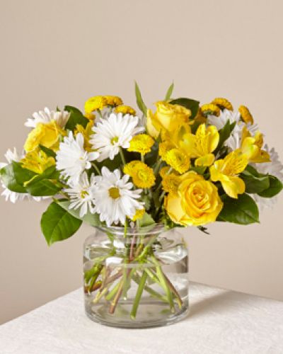 <p data-start="121" data-end="490">When words fall short, flowers have a way of saying everything with grace and beauty. The <em data-start="257" data-end="275">Sunny Sentiments</em> bouquet is a radiant reminder that even a simple gesture can bring warmth, cheer, and comfort to someone’s day. With its uplifting palette and fresh blooms, this bouquet makes every occasion feel a little brighter.</p>
<p data-start="492" data-end="888">Featuring a vibrant blend of yellow and white flowers, this cheerful arrangement is expertly designed to evoke the feeling of sunlight pouring into a room. Sunny yellow lilies and roses bring golden tones of happiness, while crisp white daisies and other complementary blooms add a soft, peaceful balance. The result is a bouquet that captures the essence of optimism, hope, and heartfelt wishes.</p>
<p data-start="890" data-end="1249">Whether you’re sending love to a friend recovering from illness, lifting a loved one’s spirits during a difficult time, or celebrating a joyful milestone like a birthday or promotion, <em data-start="1074" data-end="1092">Sunny Sentiments</em> is a thoughtful way to say “you matter.” Its bright hues and lively presence convey positivity and affection in a form that’s both beautiful and meaningful.</p>
<p data-start="1251" data-end="1593">Rosa’s La Hacienda in Boca Raton hand-delivers this arrangement with care and precision. We serve all of Boca Raton and nearby areas with same-day flower delivery, ensuring your bouquet arrives fresh and full of life. Every flower is selected for quality, and each arrangement is crafted with attention to detail that reflects your sincerity.</p>
<p data-start="1595" data-end="1849">Bring light into someone’s life today with <em data-start="1638" data-end="1656">Sunny Sentiments</em>—a bouquet that radiates pure joy, sent straight from your heart. Whether it’s for a celebration, encouragement, or just because, this bouquet lets your sentiments shine through in every bloom.</p>