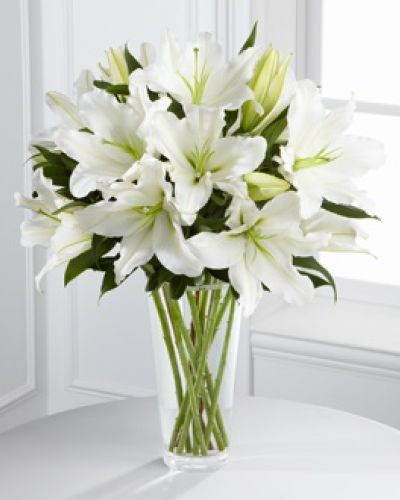<p data-start="152" data-end="478">Offer comfort, serenity, and heartfelt condolences with The FTD® Light in Your Honor™ Bouquet. This elegant arrangement is designed to express sympathy with quiet strength and graceful beauty, helping you share support during a time of loss.</p>
<p data-start="480" data-end="801">The bouquet features stunning Oriental lilies, chosen for their soft fragrance and symbolic purity. Accented with lush, fresh greenery and arranged in a clear glass vase, this design offers a refined and soothing presence. Its simplicity and elegance speak to love, remembrance, and the light that lives on in our hearts.</p>
<p data-start="803" data-end="1062">The FTD® Light in Your Honor™ Bouquet is a meaningful choice for memorial services, funerals, or personal deliveries to friends and family who are grieving. Its all-white palette and sophisticated design offer a respectful and comforting way to show you care.</p>
<p data-start="1064" data-end="1344">Every bouquet is handcrafted by the caring florists at Rosa’s La Hacienda, your trusted local flower shop in Boca Raton. We offer same-day flower delivery throughout Boca Raton and surrounding communities, with each arrangement made locally and delivered with compassion and care.</p>
<p data-start="1346" data-end="1611">Want to include a message of remembrance? Add a personal note during checkout to express your sympathy in a heartfelt way. With The FTD® Light in Your Honor™ Bouquet, you’re sending more than flowers—you’re offering comfort, grace, and support when it matters most.</p>
<p data-start="1613" data-end="1711">Order today from Rosa’s La Hacienda and let your floral tribute speak with elegance and sincerity.</p>