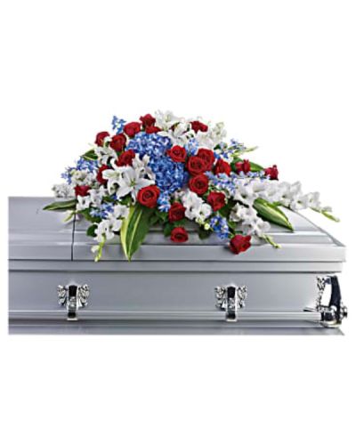 <div id="mark-1" class="m-pdp-tabs-marketing-description">
<p data-start="82" data-end="420">Honor a life dedicated to service with Teleflora’s Distinguished Service, a proud and timeless casket spray designed to reflect the values of courage, sacrifice, and love of country. This elegant half-couch arrangement offers a powerful and dignified tribute for military funerals, veterans, or anyone who held deep pride in their nation.</p>
<p data-start="422" data-end="907">This striking display features bold blue hydrangea and delphinium, symbolizing loyalty and peace. They are beautifully paired with classic red roses for love and bravery, and white oriental lilies and gladioli for purity and honor. The red, white, and blue palette mirrors the colors of the American flag, creating a heartfelt salute to a life of service. The flowers are carefully arranged for a graceful, symmetrical presentation, resting atop the casket with reverence and strength.</p>
<p data-start="909" data-end="1208">Ideal for both military and civilian funerals, this spray is a meaningful way to show respect for someone who lived with integrity and gave selflessly to others. It serves as a visual expression of gratitude and remembrance, comforting loved ones while honoring the legacy of the one who has passed.</p>
<p data-start="1210" data-end="1584">Each arrangement is expertly handcrafted by the floral team at Rosa’s La Hacienda, your trusted local florist in Boca Raton. We offer same-day delivery to funeral homes and service locations throughout the Boca Raton area, ensuring your tribute arrives fresh, elegant, and on time. Every detail is handled with care, from the choice of blooms to the thoughtful presentation.</p>
<p data-start="1586" data-end="1875">You may add a personal note at checkout to express your condolences or share a few words in memory of your loved one. At Rosa’s La Hacienda, we are honored to help families celebrate the lives of those who served with floral arrangements that speak of pride, dignity, and heartfelt thanks.</p>
<p data-start="1877" data-end="2015" data-is-last-node="" data-is-only-node="">Order today for same-day delivery in Boca Raton and nearby communities. Let us help you honor distinguished service with beauty and grace.</p>
</div>