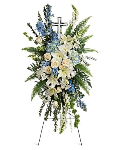 <p data-start="161" data-end="404">Offer a peaceful and elegant tribute with a floral arrangement designed to convey sympathy and comfort. The <em data-start="269" data-end="284">Eternal Grace</em> standing spray is a gentle expression of remembrance, combining soft hues and fresh greenery to honor a cherished life.</p>
<p data-start="406" data-end="644">This beautiful spray features a delicate mix of mostly white flowers accented with touches of blue and lush greenery. The combination creates a serene and refined display, perfect for providing solace during a memorial service or funeral.</p>
<p data-start="646" data-end="895">Ideal for family, friends, or business associates seeking to express heartfelt condolences, <em data-start="738" data-end="753">Eternal Grace</em> represents purity, peace, and lasting love. Its soft color palette and thoughtful design offer a comforting presence during a difficult time.</p>
<p data-start="897" data-end="1167">Each <em data-start="902" data-end="917">Eternal Grace</em> arrangement is handcrafted by the expert florists at Rosa’s La Hacienda, your trusted local florist in Boca Raton. We offer same-day delivery throughout Boca Raton and nearby communities, ensuring your tribute arrives fresh and beautifully arranged.</p>
<p data-start="1169" data-end="1335">Add a personal message at checkout to accompany this thoughtful floral gift. With <em data-start="1251" data-end="1266">Eternal Grace</em>, you send a lasting symbol of love, remembrance, and gentle support.</p>