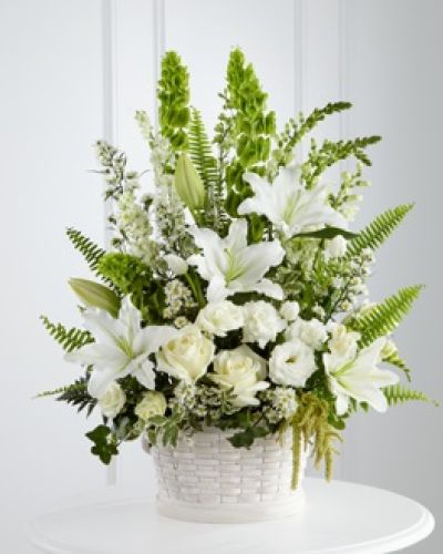 <p data-start="146" data-end="513">Express your deepest sympathies with The FTD® In Our Thoughts™ Arrangement, a serene and elegant display that speaks to the heart when words are hard to find. With its soft white blooms and fresh green accents, this arrangement offers a message of peace, comfort, and remembrance.</p>
<p data-start="515" data-end="964">This beautifully designed tribute features white roses, tulips, freesia, Oriental lilies, double lisianthus, monte casino asters, and snapdragons. Bright green Bells of Ireland, trailing ivy vines, and a variety of lush greens provide natural contrast and height, adding a sense of life and hope to the composition. The flowers are arranged in a large round whitewash basket, making it ideal for services, memorials, or sending directly to the home.</p>
<p data-start="966" data-end="1200">The FTD® In Our Thoughts™ Arrangement is perfect for honoring a loved one, supporting a grieving family, or offering a gentle reminder that they’re not alone. Its peaceful colors and graceful textures bring calm and care to any space.</p>
<p data-start="1202" data-end="1474">Each arrangement is crafted by the expert team at Rosa’s La Hacienda, your trusted local florist in Boca Raton. We offer same-day flower delivery throughout Boca Raton and nearby neighborhoods, with every tribute arranged and delivered by hand with compassion and respect.</p>
<p data-start="1476" data-end="1741">Want to include a message of condolence? Add your note during checkout to share your thoughts in a personal and heartfelt way. With The FTD® In Our Thoughts™ Arrangement, you're sending more than flowers—you’re offering comfort and connection during a time of loss.</p>
<p data-start="1743" data-end="1831">Order today from Rosa’s La Hacienda and let your care be felt in the most beautiful way.</p>