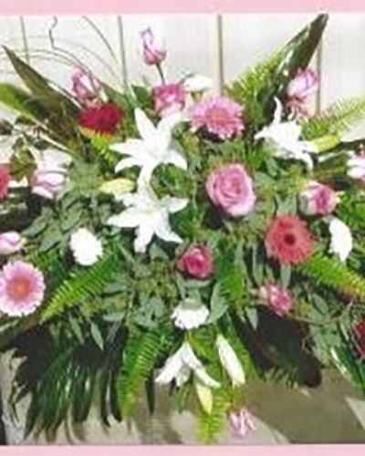 <p data-start="189" data-end="586">A life filled with warmth, love, and beauty deserves a farewell that reflects the same. The <em data-start="281" data-end="302">Warmest Remembrance</em> casket cover is a heartfelt floral tribute, designed to honor a loved one with grace, tenderness, and reverence. With rich reds, gentle pinks, crisp whites, and a generous touch of lush greenery, this full casket spray creates a stunning centerpiece for memorial or funeral services.</p>
<p data-start="588" data-end="1075">This elegant arrangement features a layered blend of red and pink roses, white lilies, carnations, and seasonal accent flowers, all cradled in a base of verdant greens. The mix of textures and tones creates a peaceful harmony—red for deep love and courage, pink for admiration and gratitude, white for purity and peace. The greens provide a natural, flowing foundation, allowing the vibrant blooms to rise and cascade gracefully over the casket, symbolizing both remembrance and renewal.</p>
<p data-start="1077" data-end="1478"><em data-start="1077" data-end="1098">Warmest Remembrance</em> is appropriate for traditional funerals, celebration of life ceremonies, and graveside services. Its balanced color palette conveys both strength and softness, making it a fitting tribute for honoring parents, grandparents, spouses, or dear friends. This design brings beauty to solemn spaces, creating a peaceful atmosphere where loved ones can gather, reflect, and say goodbye.</p>
<p data-start="1480" data-end="1905">At Rosa’s La Hacienda, we understand that funeral flowers are more than decorations—they are symbols of love, connection, and legacy. Every <em data-start="1620" data-end="1641">Warmest Remembrance</em> casket cover is carefully arranged by our experienced floral team and delivered with compassion throughout the Boca Raton area. We coordinate directly with local funeral homes and service locations to ensure timely, respectful placement and flawless presentation.</p>
<p data-start="1907" data-end="2042" data-is-last-node="" data-is-only-node="">Let the <em data-start="1915" data-end="1936">Warmest Remembrance</em> casket cover offer a final gesture of beauty and love—a lush, serene tribute to a life forever cherished.</p>
<ul id="prodDetailDelivery">
<li><span style="color: red;"><b>Local Delivery Only</b></span></li>
</ul>