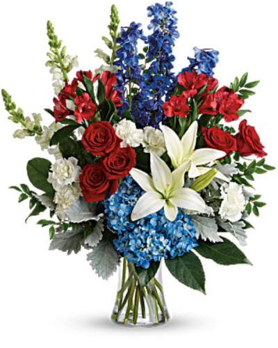 <div id="mark-3" class="m-pdp-tabs-marketing-description">
<p data-start="130" data-end="544">Honor a life well lived or celebrate a patriotic occasion with the Colorful Tribute bouquet, a vibrant and meaningful arrangement that blends red, white, and blue blooms in a graceful, uplifting design. Whether you're commemorating a loved one or expressing gratitude to someone who served, this bouquet offers a beautiful and dignified tribute.</p>
<p data-start="546" data-end="964">The Colorful Tribute features a striking mix of red roses, white Asiatic lilies, blue hydrangea, red alstroemeria, white carnations, blue delphinium, and white snapdragons. Accented with huckleberry, dusty miller, aralia leaf, and lemon leaf, the bouquet offers rich texture and fullness. Every flower is hand-selected and expertly arranged in a classic gathering vase, creating a display that is both bold and serene.</p>
<p data-start="966" data-end="1329">Ideal for memorial services, Veterans Day, Independence Day celebrations, or simply honoring someone special, this bouquet carries powerful symbolism. The red blooms express love and respect, white represents peace and remembrance, and blue reflects strength and dignity. Together, they form a touching tribute that speaks volumes when words alone are not enough.</p>
<p data-start="1331" data-end="1708">Handcrafted by the floral experts at Rosa’s La Hacienda in Boca Raton, each arrangement is made fresh to order and delivered by hand. We offer same-day flower delivery throughout Boca Raton and nearby areas, ensuring your gift arrives on time and in perfect condition. Whether you're sending to a home, church, or event, you can trust Rosa’s to deliver with care and precision.</p>
<p data-start="1710" data-end="1967">Want to include a personal message? Add your note at checkout to make your tribute even more meaningful. Whether you're celebrating a proud tradition or remembering a cherished loved one, the Colorful Tribute bouquet honors the moment with grace and beauty.</p>
<p data-start="1969" data-end="2101">Order today from Rosa’s La Hacienda for same-day flower delivery in Boca Raton and send a lasting message of honor, pride, and love.</p>
</div>