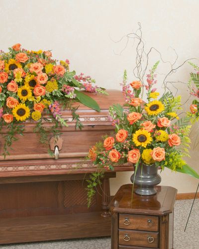 <p data-start="154" data-end="392">Honor a beautiful life with the warm, peaceful tones of a setting sun. The <em data-start="229" data-end="249">Heaven’s Gate Trio</em> offers a heartfelt floral tribute, thoughtfully designed to bring comfort and reflection through soft, radiant color and graceful composition.</p>
<p data-start="394" data-end="710">This trio includes a coordinating casket spray, standing spray, and urn arrangement—all designed in the rich, warm colors of a sunset. Featuring fresh blooms in shades of orange, gold, coral, and soft red, each arrangement is handcrafted to create a unified and inspiring presence at any funeral or memorial service.</p>
<p data-start="712" data-end="983">Ideal for close family members wishing to convey deep love and lasting admiration, the <em data-start="799" data-end="819">Heaven’s Gate Trio</em> expresses warmth, gratitude, and eternal peace. These arrangements serve as a moving reminder of a life that brought light to others and left a lasting impression.</p>
<p data-start="985" data-end="1288">Each piece is carefully designed by the expert florists at Rosa’s La Hacienda, your trusted local florist in Boca Raton. We provide same-day delivery to funeral homes and service locations throughout Boca Raton and surrounding communities, ensuring your tribute arrives fresh and thoughtfully presented.</p>
<p data-start="1290" data-end="1481">Include a personalized message at checkout to accompany this radiant tribute. With the <em data-start="1377" data-end="1397">Heaven’s Gate Trio</em>, you can say goodbye with beauty, warmth, and the peaceful grace of a final sunset.</p>