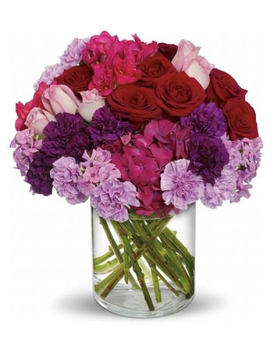 <p data-start="166" data-end="433">Make a bold and breathtaking statement of love with a bouquet that captures the full intensity of passion and devotion. The <em data-start="290" data-end="316">Sweeping Romance Bouquet</em> is a lavish display of color, fragrance, and elegance—crafted for moments when only the grandest expression will do.</p>
<p data-start="435" data-end="761">This luxurious arrangement features dark pink hydrangea, red and lavender roses, deep purple and lavender carnations, hot pink freesia, and soft lavender phlox. Hand-designed in a clear cylinder vase, the mix of rich, romantic hues creates a dramatic and unforgettable presentation—perfect for sweeping someone off their feet.</p>
<p data-start="763" data-end="1052">Whether you're celebrating an anniversary, planning a romantic surprise, or simply expressing deep affection, the <em data-start="877" data-end="903">Sweeping Romance Bouquet</em> says it all with bold color and refined beauty. Each bloom is chosen for its vibrancy and meaning, making this gift as thoughtful as it is stunning.</p>
<p data-start="1054" data-end="1344">Handcrafted by the expert florists at Rosa’s La Hacienda, your trusted local florist in Boca Raton, this bouquet is available for same-day delivery throughout Boca Raton and surrounding communities. Every arrangement is carefully prepared to ensure freshness, quality, and emotional impact.</p>
<p data-start="1346" data-end="1536">Include a heartfelt message at checkout to complete your gift. With the <em data-start="1418" data-end="1444">Sweeping Romance Bouquet</em>, you’re not just sending flowers—you’re making a lasting impression of love and admiration.</p>