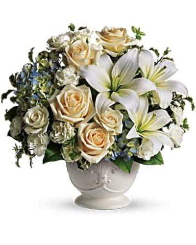 <div id="mark-2" class="m-pdp-tabs-marketing-description">
<p data-start="82" data-end="379">Offer comfort and compassion with <em data-start="116" data-end="146">Teleflora’s Beautiful Dreams</em>, a serene sympathy arrangement that brings peace and elegance to a difficult time. Styled with a soft French country charm, this bouquet is a thoughtful way to share your condolences and let loved ones know they’re in your thoughts.</p>
<p data-start="381" data-end="787">This soothing design features blue hydrangea, crème roses, white miniature carnations, and fragrant white asiatic lilies. The gentle color palette of blue, ivory, and white offers a calming presence, while green pitta negra adds soft texture and contrast. The flowers are arranged in a rustic French Country Pot, providing a timeless and understated elegance that complements the sentiment behind the gift.</p>
<p data-start="789" data-end="1050"><em data-start="789" data-end="819">Teleflora’s Beautiful Dreams</em> is ideal for sending to family, friends, or loved ones who are grieving, whether to the home or directly to a memorial service. Its graceful presentation and muted tones make it a respectful and comforting way to express sympathy.</p>
<p data-start="1052" data-end="1337">Handcrafted by the experienced florists at Rosa’s La Hacienda in Boca Raton, each arrangement is prepared with care and delivered with compassion. We offer same-day delivery throughout Boca Raton and surrounding communities, ensuring your tribute arrives fresh, beautiful, and on time.</p>
<p data-start="1339" data-end="1582">Include a personal message at checkout to share your thoughts, prayers, or heartfelt memories. With <em data-start="1439" data-end="1457">Beautiful Dreams</em>, you can offer more than flowers—you can offer comfort, beauty, and a gentle reminder that love and support are always near.</p>
<p data-start="1584" data-end="1740" data-is-last-node="" data-is-only-node="">Order today for same-day delivery in Boca Raton and nearby areas. <em data-start="1650" data-end="1680">Teleflora’s Beautiful Dreams</em> is a quiet and beautiful tribute when words are not enough.</p>
</div>