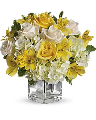 <p data-start="136" data-end="464">Bring joy to their morning and light to their heart with Sweetest Sunrise, a glowing bouquet designed to lift spirits and brighten any space. With soft, sunlit tones and a sleek modern presentation, this arrangement is perfect for delivering happiness with elegance and style.</p>
<p data-start="466" data-end="809">This cheerful design features a harmonious blend of white hydrangea, light yellow roses, crème roses, and sunny yellow alstroemeria. Fresh greenery adds a natural balance to the palette, while the bouquet is arranged in a contemporary glass cube with a mirrored silver finish that reflects light beautifully and adds a touch of sophistication.</p>
<p data-start="811" data-end="1115">Sweetest Sunrise is ideal for birthdays, thank-you gifts, congratulations, or just to make someone smile. Its uplifting colors and refined look make it a versatile choice for any occasion that calls for warmth and grace. Whether it's sent to a home or office, this bouquet is sure to be a day-brightener.</p>
<p data-start="1117" data-end="1455">Each bouquet is hand-arranged by the talented florists at Rosa’s La Hacienda, your local flower shop in Boca Raton. We provide same-day flower delivery throughout Boca Raton and the surrounding areas, always with a focus on freshness, quality, and thoughtful presentation. Every order is crafted with care—not outsourced or mass-produced.</p>
<p data-start="1457" data-end="1675">Want to add an extra personal touch? Include a heartfelt message during checkout and let your recipient know you're thinking of them. Sweetest Sunrise delivers beauty, optimism, and joy all in one stunning arrangement.</p>
<p data-start="1677" data-end="1768">Order now from Rosa’s La Hacienda and let us help you make someone’s day a little brighter.</p>