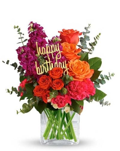 <p data-start="122" data-end="408">Bring the party to their doorstep with Bold Birthday, a bright and cheerful bouquet that’s bursting with color and festive energy. Designed to light up the room and their day, this vibrant arrangement is the perfect birthday surprise.</p>
<p data-start="410" data-end="785">The bouquet features a lively mix of orange roses, orange spray roses, and pink carnations, hand-arranged in a stylish glass cube vase. Bold, fun, and full of personality, each bloom is carefully selected to create a joyful and eye-catching display. A playful "Happy Birthday" pick may be included, depending on availability, adding a little extra sparkle to the celebration.</p>
<p data-start="787" data-end="1011">Bold Birthday is an ideal gift for friends, coworkers, or loved ones who appreciate vivid colors and upbeat vibes. Its fresh design and bold palette make it a go-to choice for marking another year with beauty and excitement.</p>
<p data-start="1013" data-end="1343">Each arrangement is crafted by the expert florists at Rosa’s La Hacienda, your trusted flower shop in Boca Raton. We offer same-day flower delivery throughout Boca Raton and the surrounding areas, ensuring your bouquet arrives fresh, fragrant, and ready to wow. Every order is made with local care—not outsourced or mass-produced.</p>
<p data-start="1345" data-end="1573">Want to include a personal note? Add your birthday wishes during checkout to make your gift even more meaningful. With Bold Birthday, you’re sending more than flowers—you’re sending celebration, color, and a big reason to smile.</p>
<p data-start="1575" data-end="1671">Order now from Rosa’s La Hacienda and turn their birthday into something bold and unforgettable.</p>