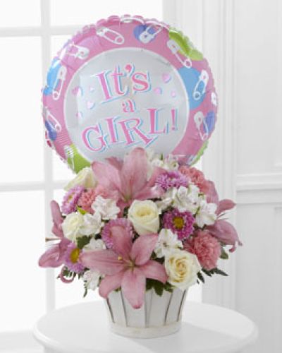 <div class="summary entry-summary">
<div class="woocommerce-product-details__short-description">
<p data-start="193" data-end="492">Nothing says “welcome to the world” quite like a beautiful bouquet bursting with love and joy. The FTD® Girls Are Great!™ Bouquet is a heartwarming way to celebrate the arrival of a baby girl, offering soft colors, fragrant blooms, and a keepsake Mylar balloon that brings smiles to everyone’s face.</p>
<p data-start="494" data-end="959">This sweet floral gift is arranged with tender care, blending timeless white roses and white Peruvian lilies with cheerful pink carnations, vibrant pink matsumoto asters, and delicate pink Asiatic lilies. Lush greenery adds a fresh, natural finish to the bouquet, which is hand-arranged in a round whitewash woodchip basket that’s both rustic and charming. The gentle palette of pink and white creates a calming, loving atmosphere that perfectly suits the occasion.</p>
<p data-start="961" data-end="1241">Topping off the bouquet is a fun “It’s a Girl!” Mylar balloon that makes the celebration feel even more festive. Whether you’re sending this to a hospital room, front porch, or baby shower venue, it’s a thoughtful way to show you care and share in the joy of this major milestone.</p>
<p data-start="1243" data-end="1537">Ideal for new parents, grandparents, or anyone eager to congratulate the growing family, this bouquet delivers your warm wishes with freshness and style. Its fragrant blooms and soft hues make it a perfect accent for a nursery or dining table, adding beauty and brightness wherever it’s placed.</p>
<p data-start="1539" data-end="1786">Hand-delivered with care by Rosa’s La Hacienda in Boca Raton, this bouquet comes with our commitment to exceptional quality and service. We understand how meaningful these moments are, and we’re here to help you honor them with elegance and grace.</p>
<p data-start="1788" data-end="1857">Celebrate the joy of new life with a floral gift as lovely as she is.</p>
</div>
</div>