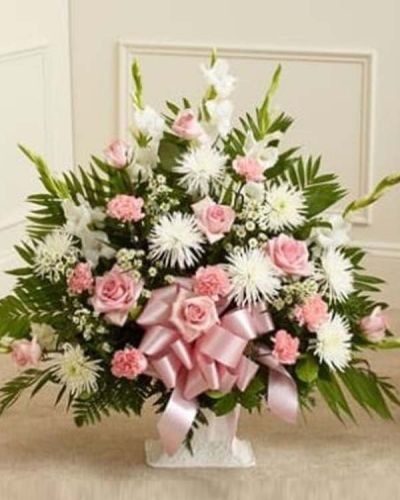 <p data-start="229" data-end="467">When it’s hard to find the right words, let the quiet beauty of flowers speak for you. The <em data-start="320" data-end="366">Touching Tribute Floor Basket – Pink & White</em> is a heartfelt expression of sympathy, offering peace, admiration, and comfort during times of loss.</p>
<p data-start="469" data-end="830">This elegant arrangement features fresh pink roses, white spider mums, white snapdragons, pink carnations, and additional seasonal blooms. Carefully arranged in a traditional floor basket, the soft pink and white color palette creates a serene and uplifting presence. The pink symbolizes gratitude and love, while the white conveys purity, peace, and reverence.</p>
<p data-start="832" data-end="1053">Ideal for sending directly to the funeral home, this tribute is appropriate for family members, close friends, or professional acquaintances. It serves as a graceful reminder of the love shared and the legacy left behind.</p>
<p data-start="1055" data-end="1340">Each <em data-start="1060" data-end="1106">Touching Tribute Floor Basket – Pink & White</em> is handcrafted by the florists at Rosa’s La Hacienda, your trusted local florist in Boca Raton. We offer same-day delivery throughout Boca Raton and nearby areas, ensuring your arrangement arrives fresh and with the care it deserves.</p>
<p data-start="1342" data-end="1533">Include a sympathy message at checkout to personalize your gift. With its gentle tones and elegant design, this basket offers a comforting way to honor a life and show your heartfelt support.</p>