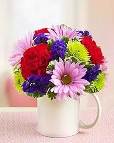 <p data-start="173" data-end="369">Brighten someone's day with a gift that's equal parts charming and cheerful. The <em data-start="254" data-end="277">Cute as a Mug Bouquet</em> is a playful and uplifting way to send warm wishes, sure to bring a smile with every bloom.</p>
<p data-start="371" data-end="653">This delightful arrangement features a seasonal mix of fresh flowers in a variety of colors, artfully arranged in a keepsake ceramic mug. Each bouquet is one-of-a-kind, with colors and blooms selected based on daily availability to ensure the freshest and most vibrant presentation.</p>
<p data-start="655" data-end="932">Perfect for birthdays, get-well gestures, thank-you gifts, or just because, this bouquet is a fun and thoughtful way to share joy and show you’re thinking of them. The reusable mug adds a personal touch that will continue to brighten their days long after the flowers are gone.</p>
<p data-start="934" data-end="1172">Every <em data-start="940" data-end="963">Cute as a Mug Bouquet</em> is handcrafted by Rosa’s La Hacienda, your trusted local florist in Boca Raton. We offer same-day delivery throughout Boca Raton and surrounding communities, with every order handled with care and creativity.</p>
<p data-start="1174" data-end="1370">Include a cheerful message at checkout to personalize your gift. With the <em data-start="1248" data-end="1271">Cute as a Mug Bouquet</em>, you’re sending more than flowers—you’re sending a little dose of happiness in every sip and stem.</p>