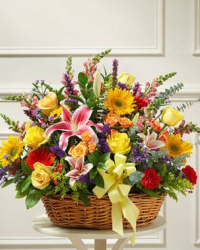 <p data-start="145" data-end="468">Even in the darkest of times, a burst of color can offer hope. The Bright Blessings Sympathy Arrangement in Basket delivers warmth, comfort, and a message of resilience through every petal. This radiant display offers a heartfelt way to honor someone special while letting loved ones know they are not alone in their grief.</p>
<p data-start="470" data-end="957">Overflowing with vibrant beauty, this sympathy arrangement includes a generous mix of sunflowers, Gerbera daisies, orange spray roses, lilies, carnations, and other fresh seasonal blooms. Each flower is selected for its symbolic meaning—sunflowers for loyalty and longevity, lilies for peace, and roses for love and remembrance. The entire bouquet is thoughtfully hand-arranged in a natural willow basket, offering rustic charm and ease of placement in the home or at a memorial service.</p>
<p data-start="959" data-end="1331">Perfect for sending to a funeral home, celebration of life, or directly to a grieving family’s doorstep, this arrangement balances sympathy with brightness. It honors the life of the departed while offering encouragement to those left behind. Whether you're expressing condolences from a distance or showing support in person, this display is both uplifting and dignified.</p>
<p data-start="1333" data-end="1783">Lovingly prepared and delivered by Rosa’s La Hacienda, your trusted local florist in Boca Raton, the Bright Blessings Sympathy Arrangement in Basket is available for same-day delivery when in stock. Every bouquet is crafted with fresh, high-quality flowers and the personal attention only a local florist can provide. Our team ensures that your gesture of support arrives beautifully and punctually—whether it's across town or just around the corner.</p>
<p data-start="1785" data-end="2012" data-is-last-node="" data-is-only-node="">Add a custom message at checkout to share your heartfelt condolences and remind recipients that brighter days will come. The Bright Blessings Sympathy Arrangement in Basket stands as a tribute to life, love, and lasting memory.</p>