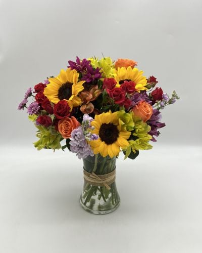 <p data-start="82" data-end="383">Celebrate their special day with a bouquet as stunning as they are. <em data-start="150" data-end="167">Birthday Beauty</em> captures the joy and warmth of a birthday celebration, making every moment feel brighter and more memorable. Sending this radiant arrangement is the perfect way to show you care and make their day truly exceptional.</p>
<p data-start="385" data-end="692">This elegant bouquet features cheerful sunflowers and classic roses, complemented by a variety of fresh seasonal blooms and lush greenery. All expertly arranged in a clear glass vase that adds a timeless touch. The mix of golden yellows and soft reds creates a vibrant, sunny display full of life and charm.</p>
<p data-start="694" data-end="904">Ideal for birthdays or any joyful occasion, <em data-start="738" data-end="755">Birthday Beauty</em> brings warmth and happiness to the recipient’s home. It’s a thoughtful gift that expresses celebration, love, and heartfelt wishes with every bloom.</p>
<p data-start="906" data-end="1085">Available for prompt local delivery in Boca Raton, Rosa’s La Hacienda ensures every bouquet is carefully crafted and delivered with care. Trust us to make your gift unforgettable.</p>
<p data-start="1087" data-end="1165" data-is-last-node="" data-is-only-node="">Make their birthday shine bright with this beautiful floral arrangement today.</p>