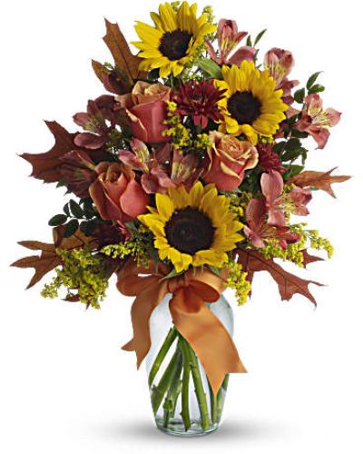 <div id="mark-1" class="m-pdp-tabs-marketing-description">
<p data-start="115" data-end="567">Send a heartfelt hug in floral form with Warm Embrace, a cheerful bouquet bursting with rustic charm and vibrant fall energy. This sunny arrangement evokes the feeling of a golden afternoon in the countryside—filled with warmth, joy, and beauty. Whether you’re celebrating a special occasion or simply sending a smile, this bouquet wraps your sentiment in a brilliant blend of color and texture.</p>
<p data-start="569" data-end="981">Warm Embrace features a joyful mix of golden yellow sunflowers, orange bi-color roses, dark orange alstroemeria, and rust-colored cushion spray chrysanthemums. These radiant blooms are accented with fresh greenery and tied together with a bright orange ribbon that adds a playful finishing touch. Arranged by hand in a classic glass vase, this bouquet delivers a visual warmth that feels both rustic and refined.</p>
<p data-start="983" data-end="1385">Perfect for birthdays, thank-you gestures, or fall celebrations, this bouquet speaks the language of joy and affection. Its color palette reflects the rich tones of the harvest season, while the sunny sunflowers and radiant roses offer a universal message of optimism and gratitude. Warm Embrace is also a popular choice for sending comfort or encouragement—like a floral embrace when words fall short.</p>
<p data-start="1387" data-end="1748">Each bouquet is expertly handcrafted by Rosa’s La Hacienda, your local florist in Boca Raton. We offer same-day flower delivery throughout Boca Raton and nearby areas, always hand-delivered with care—never boxed or outsourced. From farm-fresh stems to thoughtful finishing touches, our florists ensure every order is full of life, love, and attention to detail.</p>
<p data-start="1750" data-end="1961">Want to add a personal note? Include a heartfelt message during checkout to make your gift even more memorable. Warm Embrace is more than a bouquet—it’s a bright, rustic expression of everything you want to say.</p>
<p data-start="1963" data-end="2080">Order now from Rosa’s La Hacienda and send a burst of sunshine and color with same-day flower delivery in Boca Raton.</p>
</div>