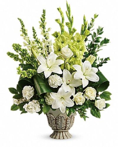 <p data-start="167" data-end="399">Offer a message of peace and heavenly remembrance with the <em data-start="226" data-end="244">Clouds of Heaven</em> arrangement. Designed to bring comfort and serenity, this stunning tribute is a graceful way to honor a life filled with light, love, and gentle strength.</p>
<p data-start="401" data-end="708">This elegant design features a harmonious blend of white roses, Asiatic lilies, carnations, snapdragons, and stock. Accents of green gladioli, Bells of Ireland, lemon leaf, myrtle, and green ti leaves provide depth and contrast, all beautifully arranged in a large antiqued pot that adds timeless character.</p>
<p data-start="710" data-end="989">Ideal for funerals, memorials, or sympathy gestures, <em data-start="763" data-end="781">Clouds of Heaven</em> evokes a sense of calm and reverence, making it a thoughtful choice for family, friends, or colleagues. The soft whites and fresh greens come together to represent both spiritual peace and heartfelt support.</p>
<p data-start="991" data-end="1269">Handcrafted with care by Rosa’s La Hacienda in Boca Raton, each arrangement is made with the freshest blooms and artistic attention to detail. We offer same-day delivery throughout Boca Raton and nearby communities to ensure your sentiments are delivered with dignity and grace.</p>
<p data-start="1271" data-end="1430">Let your message of comfort be seen and felt. With <em data-start="1322" data-end="1340">Clouds of Heaven</em>, you send a lasting tribute that reflects peace, love, and the enduring beauty of memory.</p>