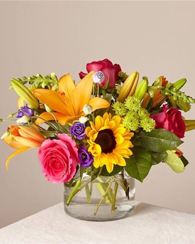 <p data-start="166" data-end="448">Celebrate life’s joyful moments with the Best Day Bouquet, a bold and cheerful arrangement designed to uplift and inspire. Bursting with vivid color and lively blooms, this bouquet is made to turn any day into the best day ever.</p>
<p data-start="450" data-end="788">This radiant mix includes sunny sunflowers, hot pink roses, purple double lisianthus, orange LA Hybrid lilies, yellow snapdragons, green button poms, and lush greens. Each flower is chosen for its brightness and beauty, then expertly arranged in a clear glass vase that keeps the focus on the colors and textures of the blooms themselves.</p>
<p data-start="790" data-end="1011">The Best Day Bouquet is perfect for birthdays, congratulations, get well wishes, or just to say “you’re on my mind.” Its joyful design and rich palette make it a standout gift that brings lasting smiles and instant cheer.</p>
<p data-start="1013" data-end="1335">Each bouquet is hand-designed by Rosa’s La Hacienda, your trusted local florist in Boca Raton. We proudly offer same-day flower delivery throughout Boca Raton and nearby neighborhoods, with every arrangement prepared locally and delivered with care. No third parties, no shortcuts—just fresh flowers and heartfelt service.</p>
<p data-start="1337" data-end="1547">Want to add a personal touch? Include a message at checkout and make the moment even more meaningful. With the Best Day Bouquet, you're not just sending flowers—you’re creating a memory they’ll always treasure.</p>
<p data-start="1549" data-end="1631">Order now from Rosa’s La Hacienda and help someone special have the best day ever.</p>