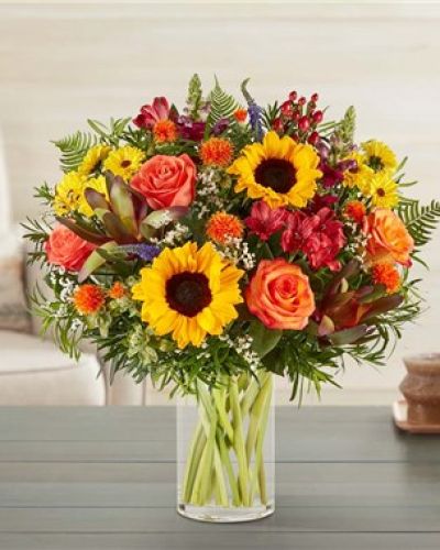 <p data-start="200" data-end="491">Capture the warmth and richness of fall with our <em data-start="249" data-end="275">Charming Foliage Bouquet</em>, a seasonal favorite designed to bring the essence of autumn indoors. With its inviting tones and rustic textures, this arrangement is like a walk through crisp fall air—earthy, vibrant, and undeniably heartwarming.</p>
<p data-start="493" data-end="912">The bouquet features a harmonious blend of fall-hued blooms, including golden sunflowers, bronze chrysanthemums, burnt orange roses, and deep red alstroemeria. Accented with eucalyptus, solidago, and seasonal greens, each flower adds a unique layer of texture and color that reflects nature’s changing palette. The loose, garden-style design evokes the charm of a handpicked arrangement fresh from a countryside meadow.</p>
<p data-start="914" data-end="1262">Presented in a classic clear glass vase, the <em data-start="959" data-end="985">Charming Foliage Bouquet</em> balances rustic elegance with modern simplicity. The transparency of the vase highlights the natural stems and showcases the artistry of the arrangement. It’s a centerpiece-worthy display that fits effortlessly into any fall setting, from cozy cottages to festive tablescapes.</p>
<p data-start="1264" data-end="1515">Perfect for Thanksgiving gatherings, fall birthdays, or simply sending seasonal cheer, this bouquet is a thoughtful way to celebrate the beauty of autumn. Its welcoming tones make it ideal for warming up homes or expressing gratitude and appreciation.</p>
<p data-start="1517" data-end="1829">Handcrafted by the skilled florists at Rosa’s La Hacienda in Boca Raton, FL, each bouquet is made to order using the freshest flowers available. While slight substitutions may occur based on local availability, the overall design and warm fall aesthetic will always remain true to its name—charming in every way.</p>
<p data-start="1831" data-end="2128">We offer same-day local delivery throughout Boca Raton and surrounding areas, ensuring your thoughtful gift arrives fresh and on time. Whether you’re sharing seasonal joy with someone special or adding a festive touch to your home, the <em data-start="2067" data-end="2093">Charming Foliage Bouquet</em> makes fall feel even more magical.</p>