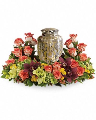 <p data-start="171" data-end="411">Offer a heartfelt tribute that gently embraces cherished memories with grace and warmth. The <em data-start="264" data-end="284">Sunset In Memoriam</em> arrangement is a beautiful expression of sympathy, designed to honor a loved one with subtle richness and thoughtful elegance.</p>
<p data-start="413" data-end="706">This oval-shaped garden features a harmonious blend of orange roses combined with cymbidium orchids, gladioli, chrysanthemums, hypericum, and delicate greenery. The warm hues evoke the serene beauty of a sunset, creating a comforting and reflective presence at any memorial or funeral service.</p>
<p data-start="708" data-end="947">Ideal for those seeking to convey deep sympathy with a gentle touch, this arrangement speaks of remembrance, hope, and lasting affection. Please note, this arrangement does not include an urn and is intended as a standalone floral tribute.</p>
<p data-start="949" data-end="1251">Each <em data-start="954" data-end="974">Sunset In Memoriam</em> is handcrafted by the expert florists at Rosa’s La Hacienda, your trusted local florist in Boca Raton. We provide same-day delivery to funeral homes and memorial venues throughout Boca Raton and surrounding areas, ensuring your tribute arrives fresh and respectfully arranged.</p>
<p data-start="1253" data-end="1440">Add a personal message at checkout to accompany this beautiful expression of care. With <em data-start="1341" data-end="1361">Sunset In Memoriam</em>, you send more than flowers—you send a lasting symbol of love and remembrance.</p>