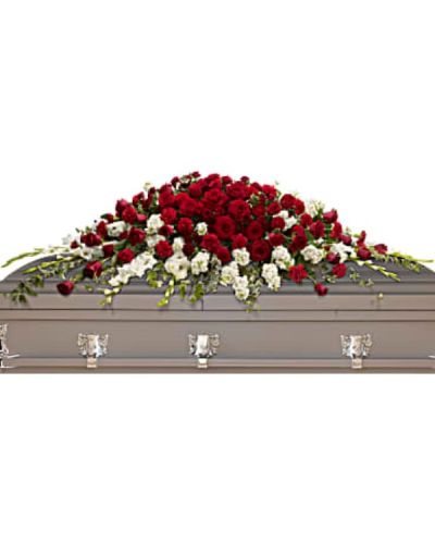 <div id="mark-1" class="m-pdp-tabs-marketing-description">
<p data-start="89" data-end="486">Pay tribute to a life of deep love and enduring devotion with <em data-start="151" data-end="196">Teleflora’s Garden of Grandeur Casket Spray</em>. This traditional and dramatic floral arrangement speaks volumes through its striking combination of red and white blooms, symbolizing both passionate remembrance and peaceful farewell. Designed for a full couch or closed casket, it makes a powerful and heartfelt statement at the service.</p>
<p data-start="488" data-end="879">The spray features rich red roses and carnations, expressing love, admiration, and loyalty. These bold blooms are beautifully balanced by pure white gladioli and white stock, which bring an air of serenity and spiritual grace to the arrangement. Lush greenery, including variegated ivy and salal, adds texture and natural fullness, enhancing the overall elegance and presence of the display.</p>
<p data-start="881" data-end="1186"><em data-start="881" data-end="901">Garden of Grandeur</em> is an ideal choice for honoring a spouse, parent, or cherished family member whose legacy is rooted in strength, love, and lasting connection. The red and white palette captures both the intensity of grief and the purity of your tribute, offering comfort and dignity in equal measure.</p>
<p data-start="1188" data-end="1458">Each spray is handcrafted by the floral experts at Rosa’s La Hacienda in Boca Raton. We offer same-day delivery to funeral homes and memorial locations throughout Boca Raton and nearby communities, ensuring your tribute is delivered fresh, full, and presented with care.</p>
<p data-start="1460" data-end="1680">You may add a personal message at checkout to share your thoughts or express your love. At Rosa’s La Hacienda, we are honored to help you commemorate life’s most meaningful moments with flowers that speak from the heart.</p>
<p data-start="1682" data-end="1862" data-is-last-node="" data-is-only-node="">Order today for same-day delivery in Boca Raton and surrounding areas. <em data-start="1753" data-end="1798">Teleflora’s Garden of Grandeur Casket Spray</em> is a timeless and majestic farewell to a life deeply cherished.</p>
</div>