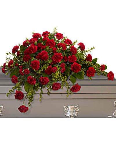 <div id="mark-1" class="m-pdp-tabs-marketing-description">
<p data-start="72" data-end="395">Honor a cherished life with the timeless beauty of the <em data-start="127" data-end="151">Adoration Casket Spray</em>, a refined floral arrangement that speaks with quiet strength and heartfelt sincerity. Composed of vivid red carnations and lush greenery, this elegant half-couch spray offers a dignified expression of love, remembrance, and enduring devotion.</p>
<p data-start="397" data-end="769">Rich red carnations form the heart of this arrangement, symbolizing admiration, loyalty, and deep affection. Their bold color and uniform beauty create a striking visual presence that is both respectful and moving. Accented with fresh oregonia and salal, the greenery provides a natural frame that enhances the vivid red blooms and adds texture and fullness to the design.</p>
<p data-start="771" data-end="1070">Perfect for both open and closed casket services, the <em data-start="825" data-end="849">Adoration Casket Spray</em> is a traditional and meaningful choice for expressing lasting love and respect. Its simplicity and elegance make it well suited for honoring a spouse, parent, or close family member whose memory will always be treasured.</p>
<p data-start="1072" data-end="1374">Handcrafted by the skilled florists at Rosa’s La Hacienda in Boca Raton, each spray is carefully arranged with attention to detail and compassion. We offer same-day delivery to funeral homes and service venues throughout the Boca Raton area, ensuring your tribute arrives fresh, beautiful, and on time.</p>
<p data-start="1376" data-end="1609">Include a personal note of sympathy at checkout to share your message of remembrance. At Rosa’s La Hacienda, we are honored to help you say goodbye with flowers that reflect your deepest emotions and the dignity of a life well lived.</p>
<p data-start="1611" data-end="1765" data-is-last-node="" data-is-only-node="">Order today for same-day delivery in Boca Raton and surrounding communities. The <em data-start="1692" data-end="1716">Adoration Casket Spray</em> is a graceful farewell to someone forever loved.</p>
</div>