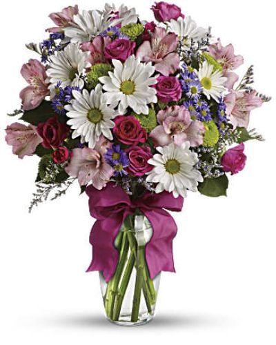 <p data-start="166" data-end="591">There’s something irresistible about a bouquet that simply radiates charm—and <em data-start="244" data-end="259">Pretty Please</em> does just that. With soft pinks, playful purples, and lush greenery tied together in a sweet lavender ribbon, this bouquet is a cheerful surprise that feels like a smile in floral form. Whether you’re saying thank you, celebrating a milestone, or just making someone’s day a little brighter, this arrangement speaks from the heart.</p>
<p data-start="593" data-end="1023">A lovely mix of roses and seasonal blooms bursts with color and texture, blending gentle pink petals with deeper violet tones and delicate touches of green. Each flower is chosen for its freshness and beauty, then artfully arranged in a clear glass vase that lets every stem shine. The finishing touch—a tied purple ribbon—adds a pop of personality and a polished presentation, perfect for display on a desk, table, or nightstand.</p>
<p data-start="1025" data-end="1413"><em data-start="1025" data-end="1040">Pretty Please</em> is a go-to gift for all kinds of occasions: birthdays, get well wishes, new beginnings, or spontaneous “just because” moments. It’s equally suited for friends, family members, coworkers, or partners—anyone who could use a burst of beauty to brighten their space and spirit. With its joyful palette and all-around versatility, this bouquet is as thoughtful as it is pretty.</p>
<p data-start="1415" data-end="1771">Handcrafted and hand-delivered by Rosa’s La Hacienda, your trusted local florist in Boca Raton, each bouquet arrives with care and attention to detail. We offer same-day delivery throughout the area, so you never have to miss a moment when it matters most. From heartfelt gestures to everyday surprises, we’re here to help you express yourself beautifully.</p>
<p data-start="1773" data-end="1874" data-is-last-node="" data-is-only-node="">Let <em data-start="1777" data-end="1792">Pretty Please</em> deliver the message you’re holding in your heart—sweet, simple, and full of love.</p>