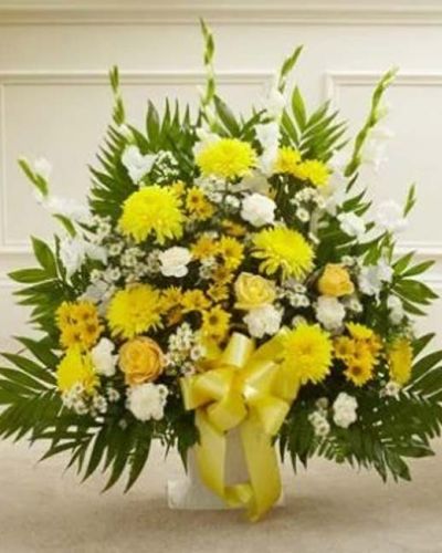 <p data-start="197" data-end="528">In times of grief, even the smallest light can bring great comfort. The <em data-start="269" data-end="309">Touching Tribute Floor Basket – Yellow</em> offers a warm, uplifting expression of sympathy that shines with hope, remembrance, and heartfelt support. Designed to honor a life and bring peace to those mourning, this arrangement is both elegant and compassionate.</p>
<p data-start="530" data-end="834">This thoughtful floor basket features a sunny selection of fresh yellow roses, bright yellow cremones, crisp white gladiolas, soft carnations, monte casino, and seasonal greenery. Hand-arranged into a graceful standing display, it brings warmth and a sense of serenity to any funeral or memorial setting.</p>
<p data-start="836" data-end="1114">Ideal for friends, family members, or colleagues to send directly to the funeral home, this tribute offers a respectful and dignified way to express condolences. The yellow hues represent friendship, remembrance, and light—making it a comforting gesture during a difficult time.</p>
<p data-start="1116" data-end="1459">Each <em data-start="1121" data-end="1161">Touching Tribute Floor Basket – Yellow</em> is handcrafted by the experienced florists at Rosa’s La Hacienda in Boca Raton. We offer same-day delivery to funeral homes and memorial venues across Boca Raton and surrounding communities. With each order, we ensure the freshest flowers and most caring service—never outsourced, always personal.</p>
<p data-start="1461" data-end="1685">Add a custom sympathy message at checkout to accompany your gift. Let this bright and elegant tribute help you show your support, share in their sorrow, and celebrate the life of someone who made the world a little brighter.</p>
<p data-start="1687" data-end="1794">Order today from Rosa’s La Hacienda—where every tribute is crafted with care and delivered with compassion.</p>
